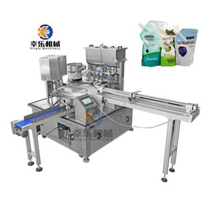 Machine de remplissage et de capsulage automatique de sac de bec de détergent liquide