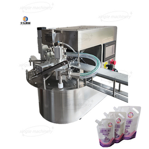 Machine de remplissage et de capsulage automatique de poche de bec de pâte liquide