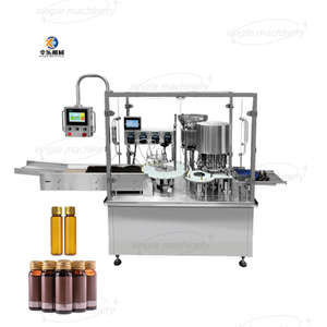 Machine de remplissage et de capsulage de flacons de sirop liquide oral automatique rotatif