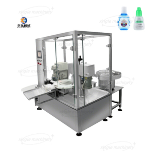 Machine automatique de remplissage et de capsulage de gouttes oculaires de bouteilles en flacon de 2 à 30 ml