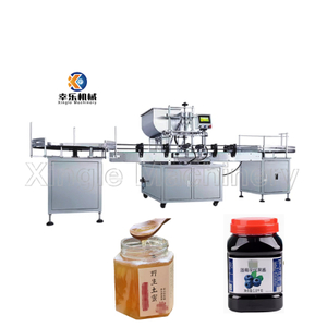 Machine de remplissage automatique de pâte liquide à trois têtes de haute précision