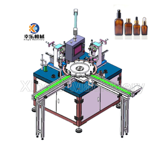 Machine de remplissage et de capsulage de flacons de parfum liquide entièrement automatique