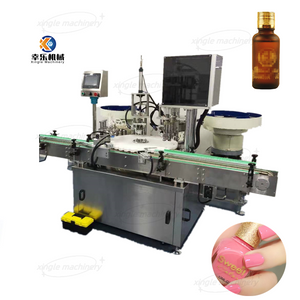 Machine de remplissage et de capsulage de flacons de vernis à ongles à double tête entièrement automatique